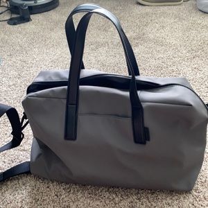 Away brand Everywhere Bag -Asphalt nylon.Slides onto standard rolling suitcases.